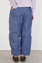 back view of model wearing bergfabel sandra pants blue