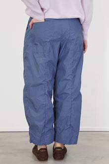 back view of model wearing bergfabel sandra pants blue