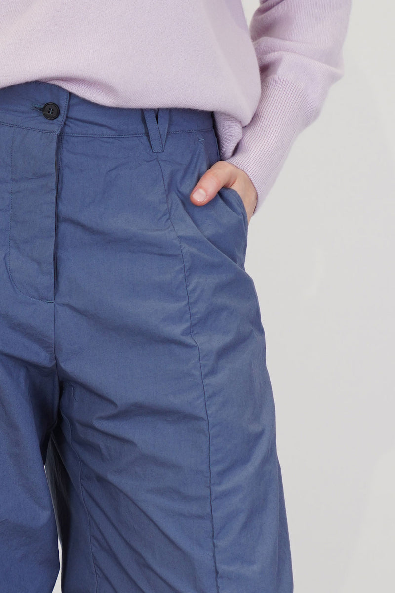 close up view of bergfabel sandra pants blue button front opening anf belt loop details