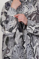 detail view of casey casey manon shirt greys print buttons details at the cuffs
