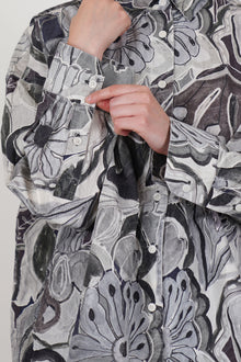 detail view of casey casey manon shirt greys print buttons details at the cuffs