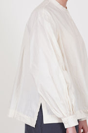 casey casey biggy grandad shirt natural hemline that is slightly longer at the back and side slit detail