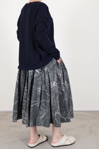 profile view of casey casey double rideaux skirt ikat grey worn with seamless jumper cashmere night 
