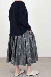 profile view of casey casey double rideaux skirt ikat grey worn with seamless jumper cashmere night 
