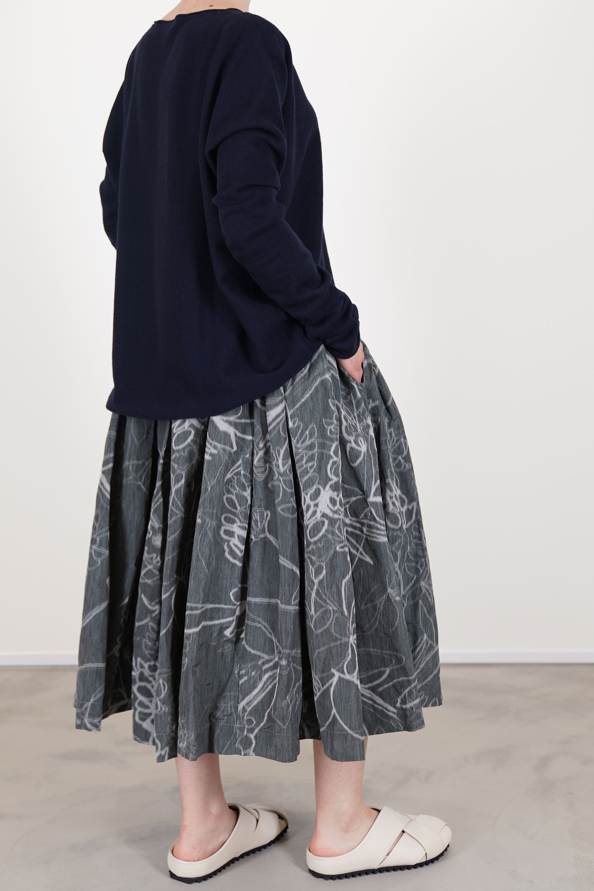 profile view of casey casey double rideaux skirt ikat grey worn with seamless jumper cashmere night 