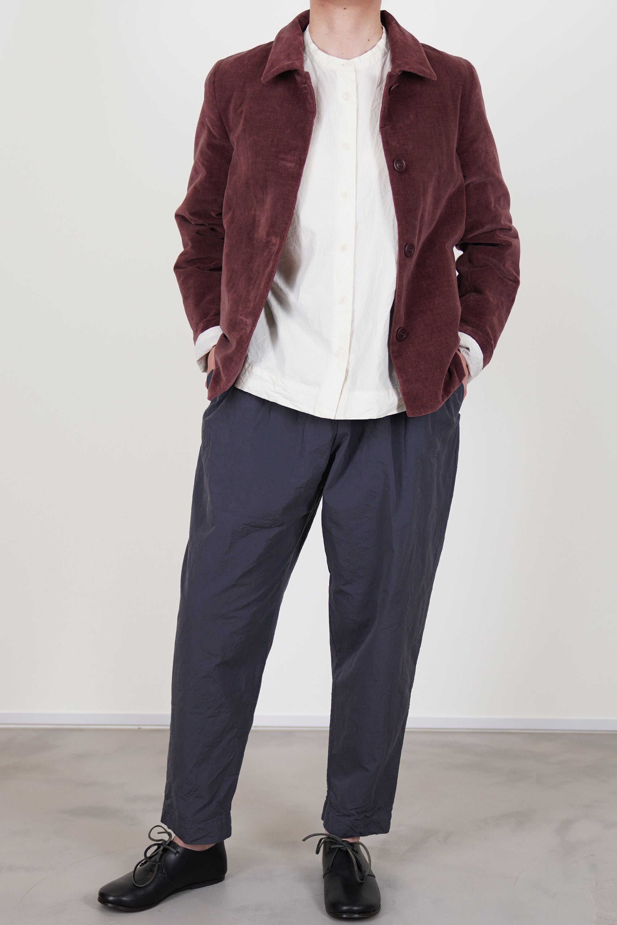 casey casey tippy pant blu skullfeaturing side seam pockets, a relaxed and loose fit, tapered leg.
