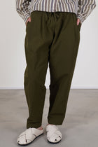 casey casey tippy pant green lake featuring side seam pockets, a relaxed and loose fit, tapered leg.