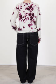 back view of casey casey paulo pant denim black featuring two back patch pockets and contrast stitching details
