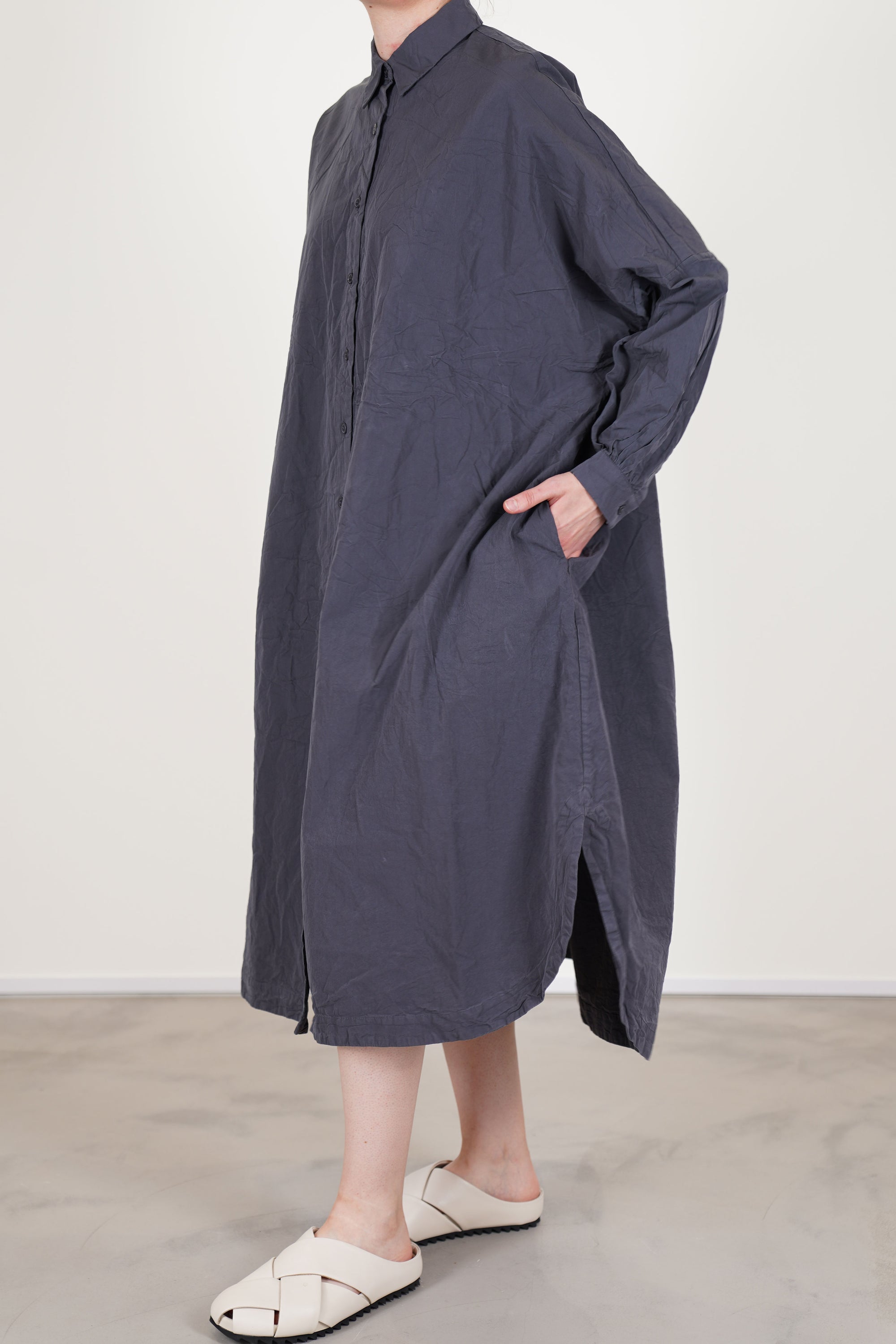 casey casey yuki dress blu skull shirt dress style with a button front opening and long sleeves. 