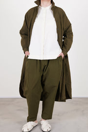 casey casey yuki dress green lake worn as an overcoat and paired wit matcing tippy pants