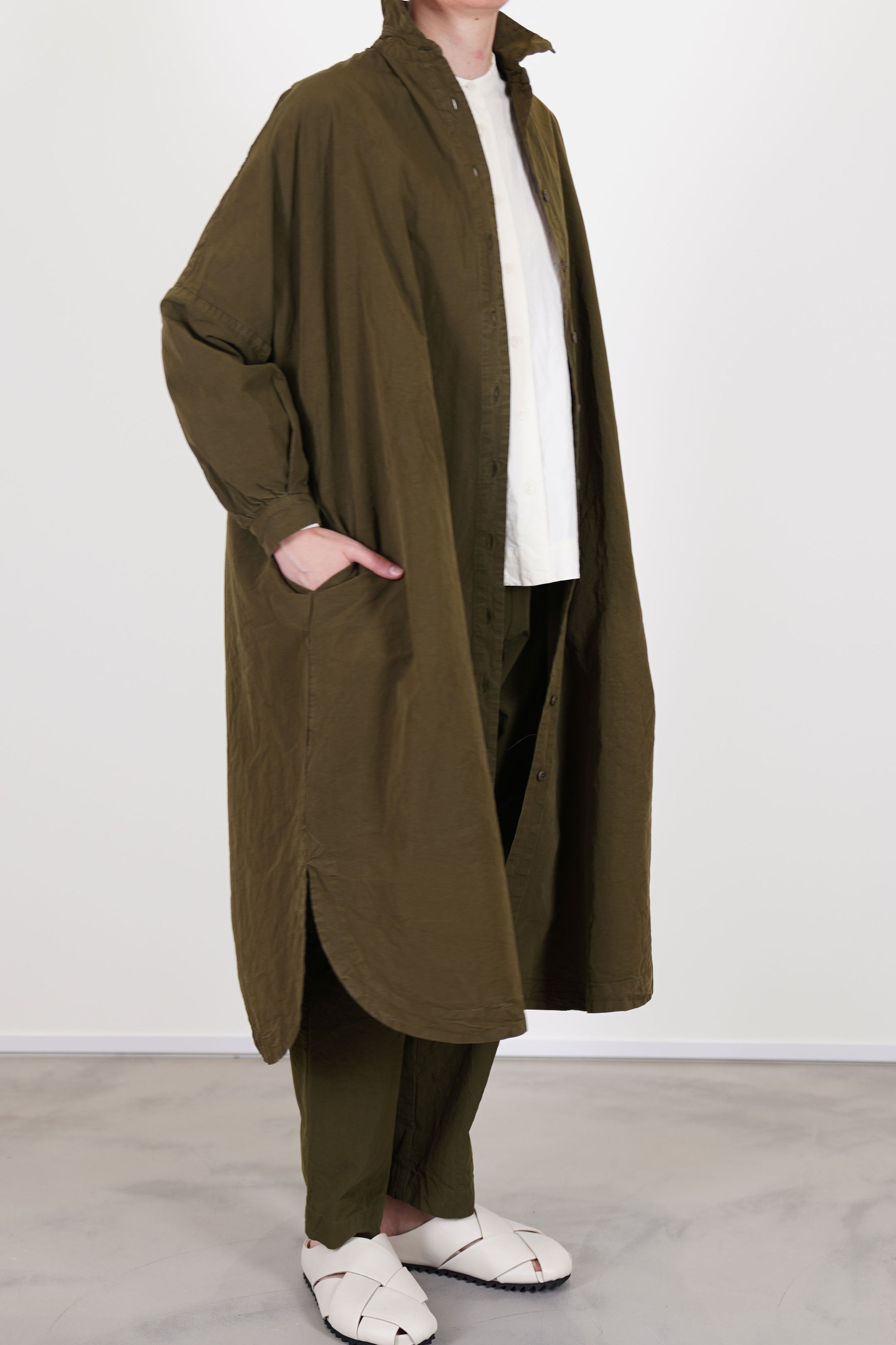 casey casey yuki dress green lake worn as an overcoat and paired wit matcing tippy pants in a relaxed and slow fashion style