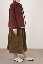 profile view of casey casey pwet jacket velvet prune soft, plush and dry to the touch cotton material