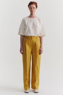 model wearing casey casey sienna pant tough poplin tango with casual outfit