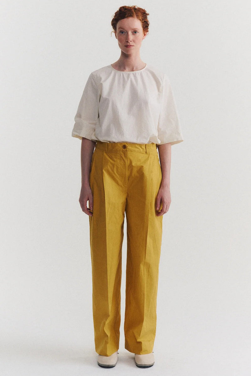 model wearing casey casey sienna pant tough poplin tango with casual outfit