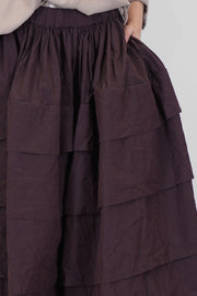 close up view of casey casey horizon skirt wine layered construction
