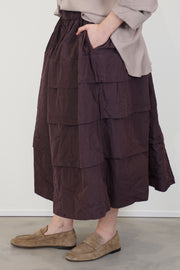 profile view of casey casey horizon skirt wine 