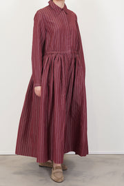 model wears casey casey panzy dress cotton silk wine