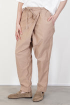 detail view of the casey casey tied sarouel pant cotton beige wrap closure