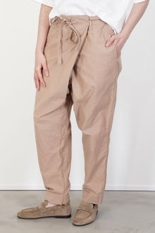 detail view of the casey casey tied sarouel pant cotton beige wrap closure