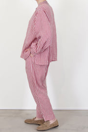 profile view of casey casey tied sarouel pant stripe tapered leg and refined silhouette