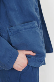 detail view of casey casey workwear puddy jacket tuareg blue fluid and soft material