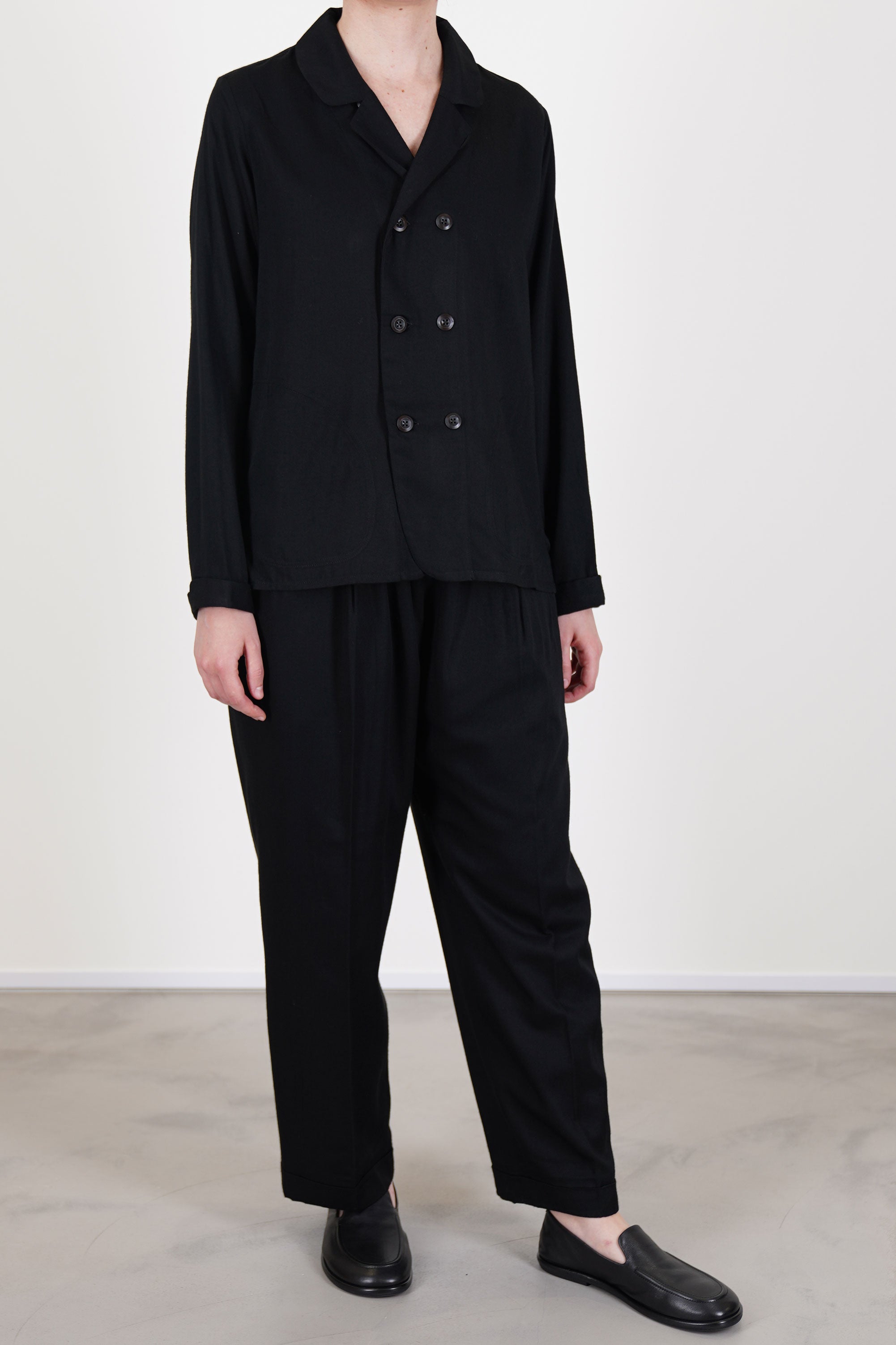 école de curiosités shirt jacqueline black worn with matching patricia pants black for a sophisticated and elegant look