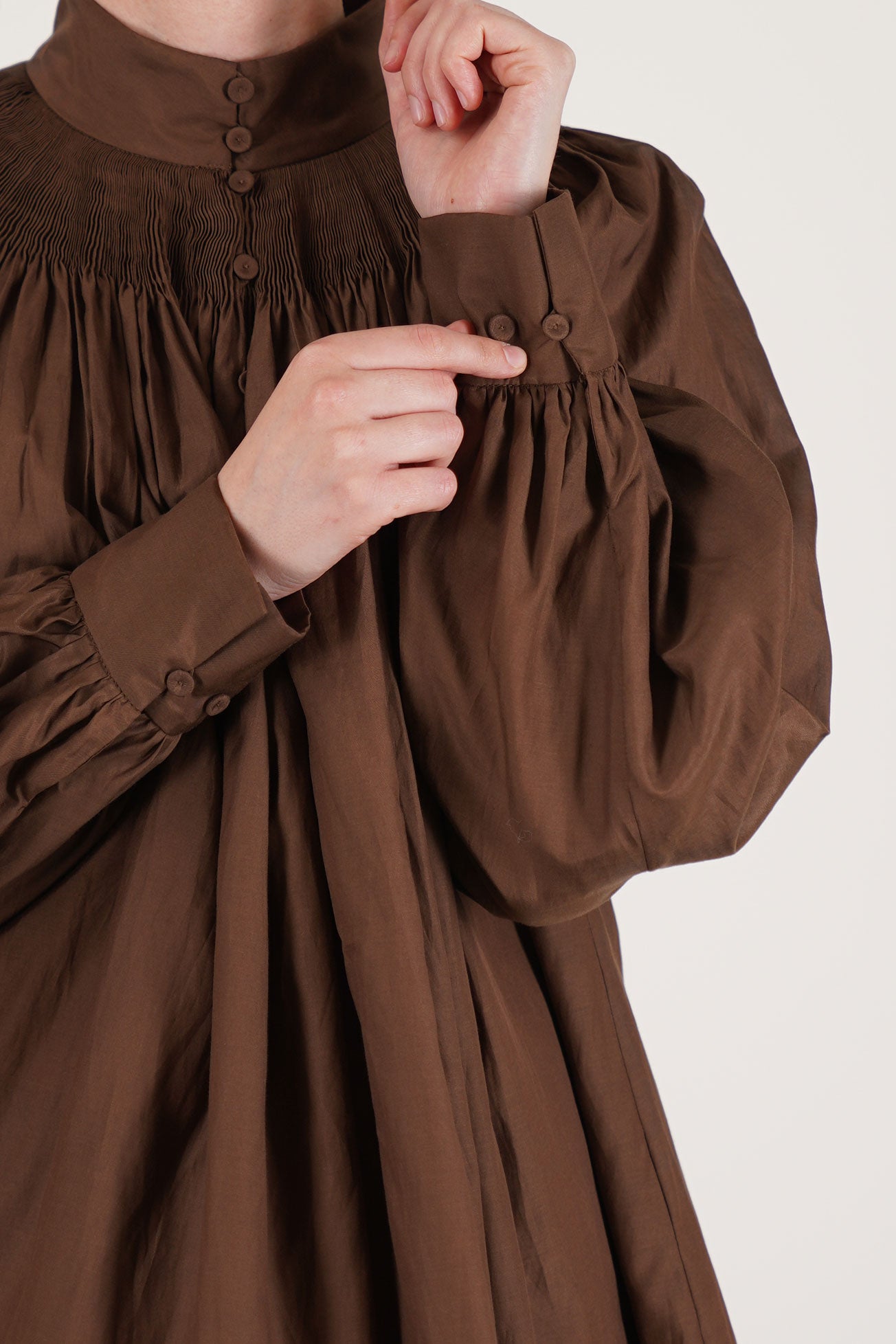 detail view of école de curiosités shirt anne cotton silk brown limited edition piece