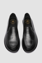 Italian-made black loafers by Officine Creative, crafted from premium supple leather