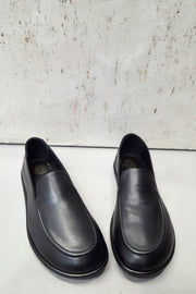 Officine Creative Mienne 101 black leather loafers handcrafted in Italy, featuring soft, supple leather and a slim rubber sole
