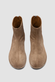 Close-up of Officine Creative suede boots showing handcrafted Italian construction, soft suede texture
