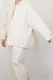 profile view of oyuna absent paper jacket ivory oversized silhouette