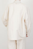 back view of oyuna absent paper jacket ivory