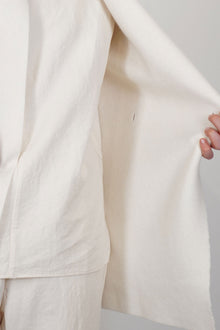 closeu up view of oyuna moon jacket cashmere ivory soft felted material