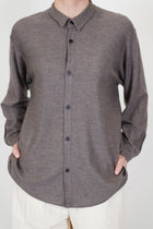 front detail view of oyuna omou knitted shirt moccha button opening and small pointed collar