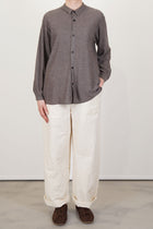 model wearing oyuna omou knitted shirt moccha