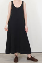 model wearing oyuna quiet knitted cotton dress black