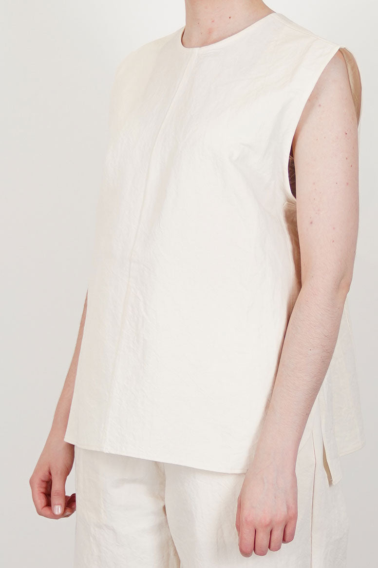 profile view of oyuna still paper top sleeveless designivory