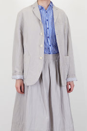 front view of pas de calais jacket cotton linen grey button front opening and long sleeves
