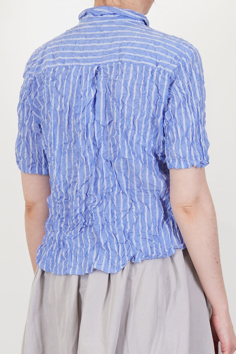 back view of pas de calais shirring stripe blouse saxe blue back pleat detail and short sleeves