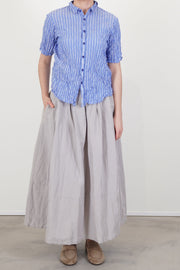 model wearing pas de calais skirt cotton linen grey