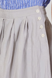 detail view of pas de calais skirt cotton linen grey side button opening for an effortless fit