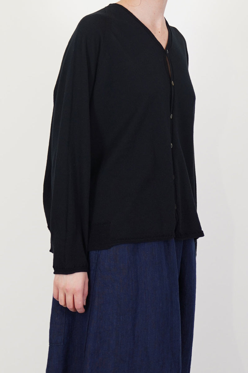 side view of pas de calais cardigan cotton linen black effortless and modern look