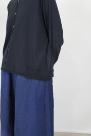 close up of pas de calais cardigan cotton linen black hemline and soft drape