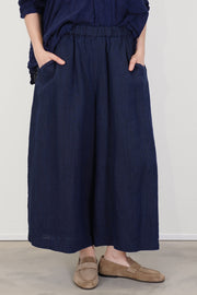 front view of pas de calais chambray wide pants linen indigo wide structural silhouette