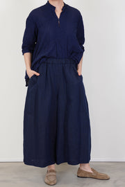 model wearing pas de calais chambray wide pants linen indigo