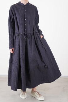 pas de calais cotton typewriter dress charcoal featuring a band collar, half pannel button front opening, long slim sleeves and pocket details