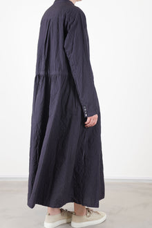 back view of pas de calais cotton typewriter dress charcoal multiple button details at the cuffs, back pleat detail and relaxed fit
