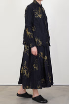 side view of pas de calais japonism flower print skirt navy midi style design