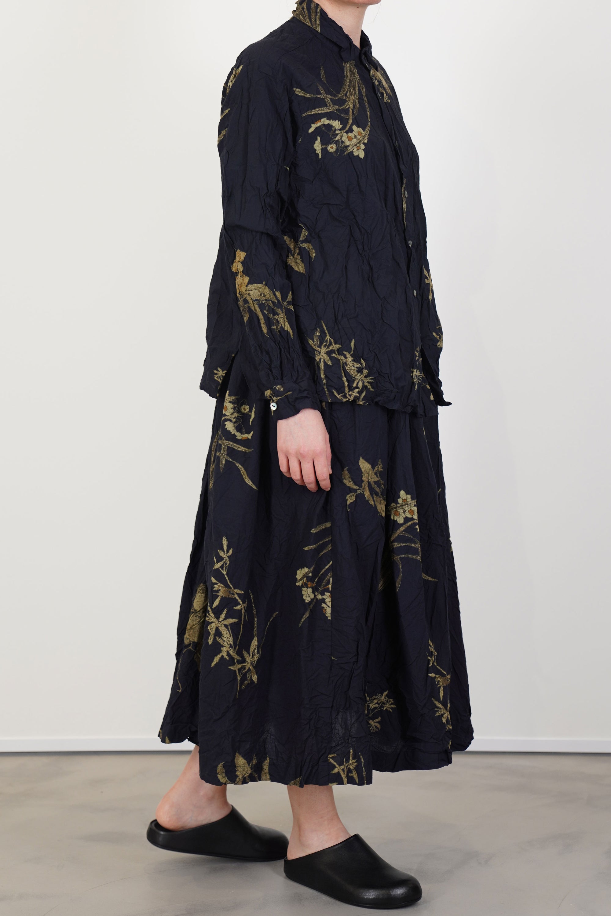 side view of pas de calais japonism flower print skirt navy midi style design