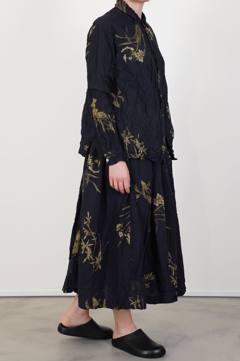 side view of pas de calais japonism flower print skirt navy midi style design